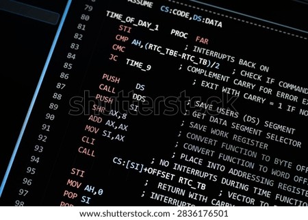 Close up of computer programming code on a dark screen, illustrating software development, cybersecurity, data processing, artificial intelligence, coding, algorithms and advanced digital technology.