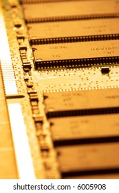 close up of a computer RAM memory in brown color.