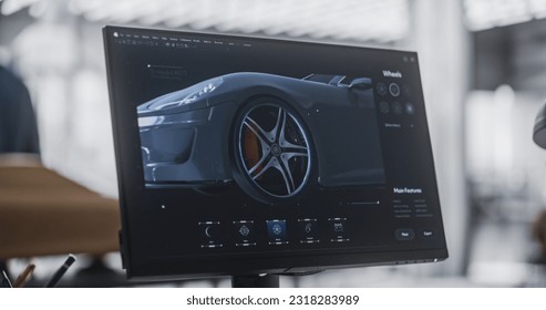 Close Up Computer Screen with 3D Customization Software for a Prototype Car. Gaming Experience for a Person Choosing Different Wheel Options for a Modern Automobile in a Vehicle Dealership Center - Powered by Shutterstock