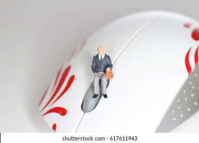 a Close up of a computermouse and figure