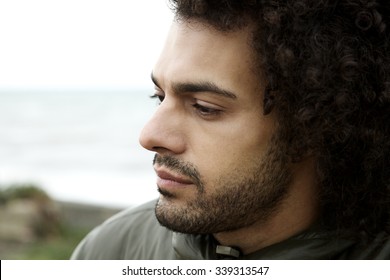 Close Up Of Cool Man Sad And Depressed During A Bad Cold Day In Winter