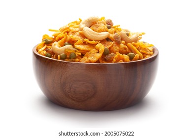 Close up of corn flex mixture Indian namkeen (snacks) In hand-made (handcrafted) wooden bowl