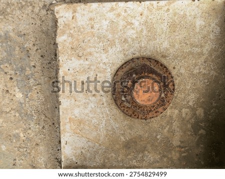 Close Up of Corroded Rusty Bolts and Nuts Installed on Steel Baseplate Structure
