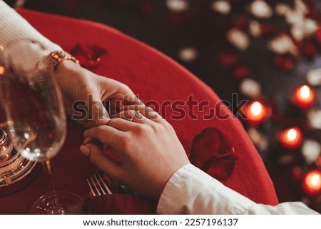 Similar – Image, Stock Photo Couple holding hands and dancing on a rooftop
