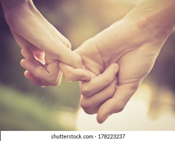 Close Up Of Couple Holding Hands, Vintage Color