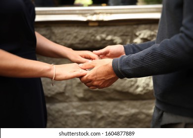 A Close Up Of A Couple Holding Hands Wedding Rehearsal