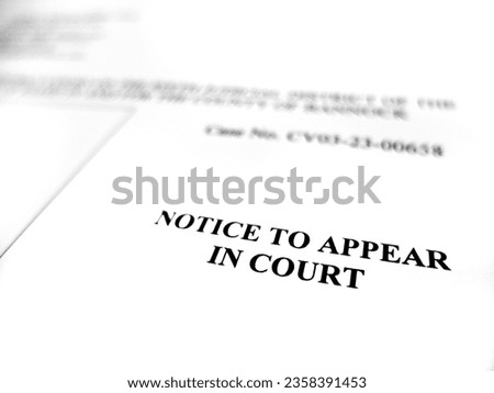 Close up of Court filing legal document Notice to Appear in Court