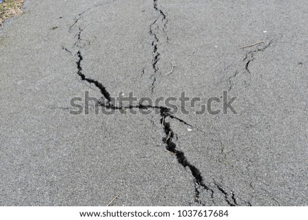 Similar – Cracks in asphalt Pothole