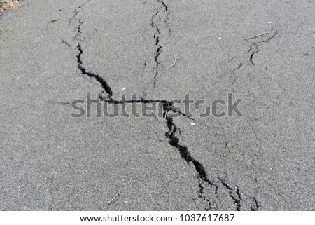 Similar – Cracks in asphalt Pothole