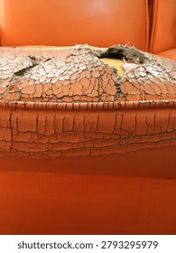 Close Up of Cracked Sofa Leather Texture with Aged Upholstery Surface Detail