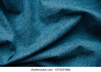 Close Up Creased Jeans Texture Background Material. Linen Blue Denim Fabric Folded And Creased Pattern. - Powered by Shutterstock