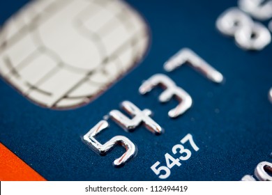 A Close Up Of A Credit Card Number And Chip