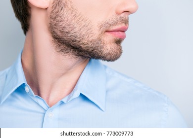 Close Up Cropped Half Face Photo Of Stylish Young Man's Bristle With Thoughtful, Minded Expression Against Grey Backdrop