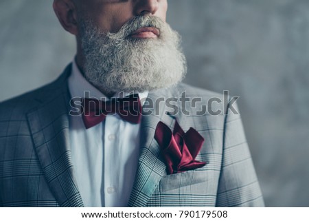 Similar – Man in suit wearing a bowtie