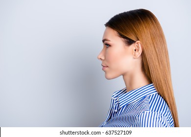 Close Up Cropped Profile Portrait Of Young Business Lady In Striped Shirt With Serious Face On Pure Background With Copy Space