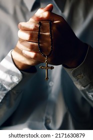 Close Up Cross. Asian Man Praying For Blessings To Jesus It Is The Confession Of Sins Before God By Holding The Cross And Closing The Eyes. Concept Payer Faith Believe