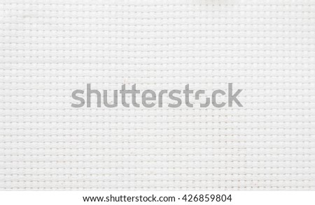 Close up of cross stitch texture background.