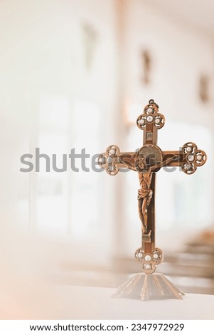close up crucifix of jesus christ in catholic church, copy space for text