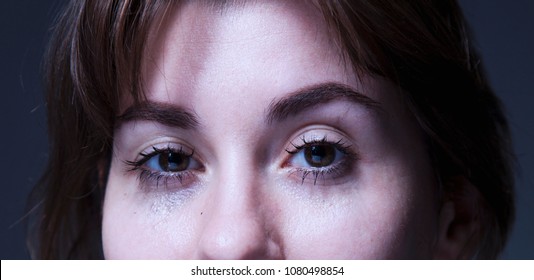 Close up of crying business woman working overtime with low wages without career perspective. (Body language, gestures, psychology concept)