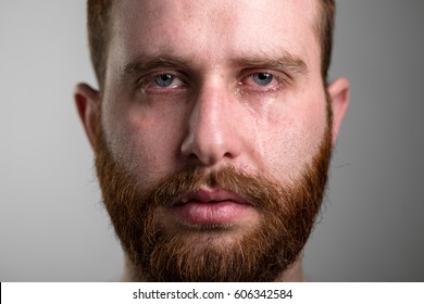 Close Up of a Crying Man with Red Beard