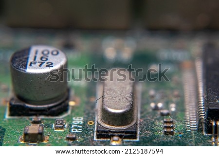 Close Up of Crystal Oscilator in PCB