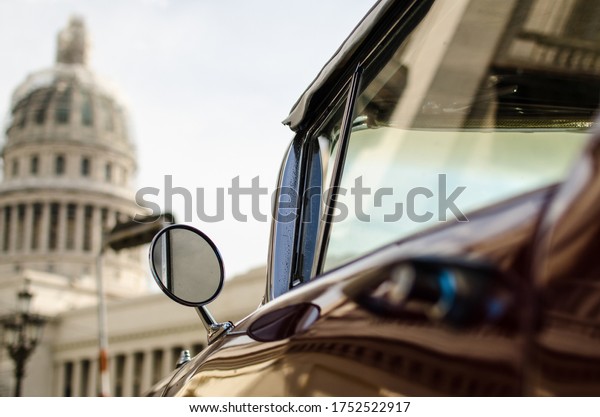 close up of\
Cuban vintage car side mirror\
detail