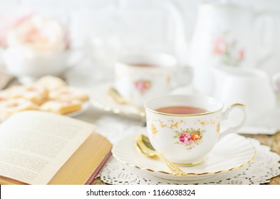 Close up of cup of tea on table with vintage tone - Afternoon tea party concept - Powered by Shutterstock