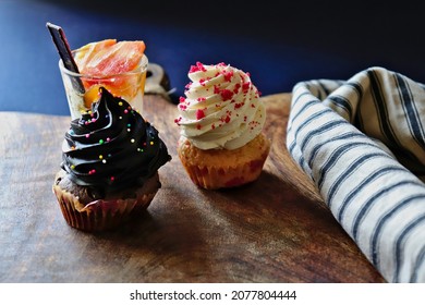 Close up of cupcakes on a wooden board