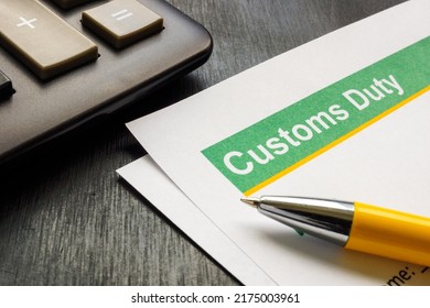 Close up of Customs duty papers and pen. - Shutterstock ID 2175003961