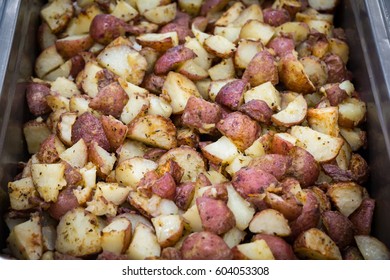 Close Up Of Cut Red Skin Potatoes In A Stainless Steel Pan