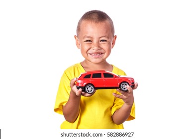 boy with toy car