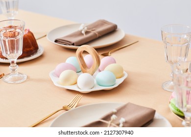 Close Up Of Cute Easter Eggs Platter On Elegant Dinner Table Decorated For Spring, Copy Space