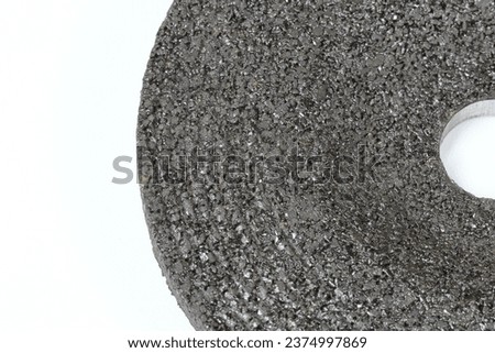Close up of cutting or grinding wheel surface isolated on white background.