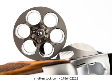 Close Up Of Cylinder Of Revolver Pistol Gun On White Background