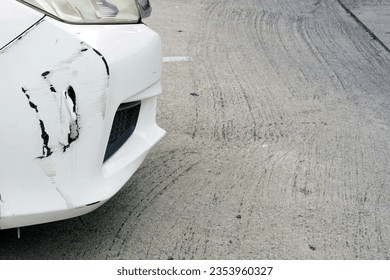 Close up of a damange white car from accident for texture and background.