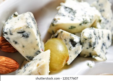 Close up of Danish blue cheese pieces.