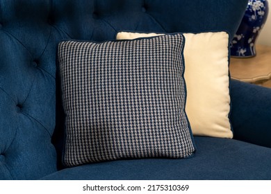 Close Up Dark Blue Fabric Sofa With Warm Cozy Home Interior Background. Pillows On Blue Sofa Room Decoration Background