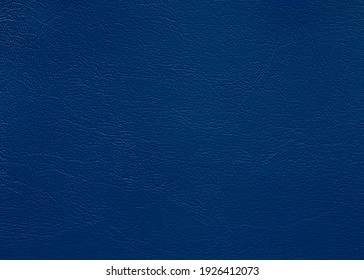 Close up dark blue leather texture, background.