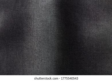 Close Up Of Dark Tencel Fabric. Tencel   (Lyocell) Is A Form Of Rayon That Consists Of Cellulose Fibre Made From Dissolving Pulp. Top View. Copy Space. 