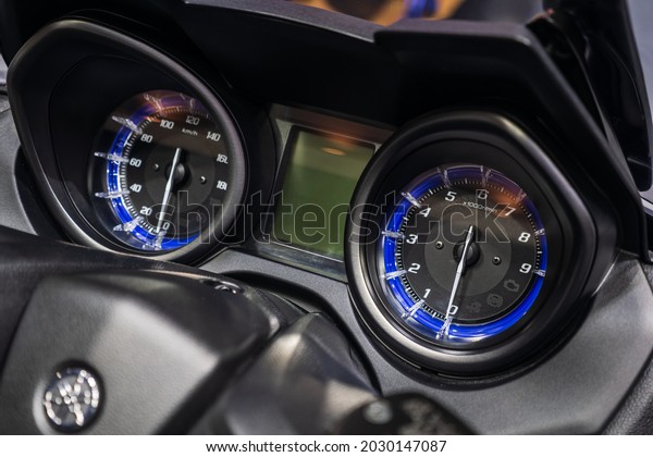 Close up dashboard of\
mileage motorcycle.