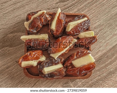 Close up of dates stuffed with butter. 
