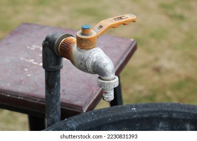 Close up of dead water faucet with blurred background. - Shutterstock ID 2230831393