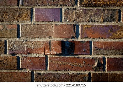 Close Up Of A Defective Brick In A Wall With Joints And Grout