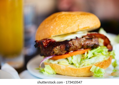 Close up of delicious fresh burger with cheese and bacon - Powered by Shutterstock