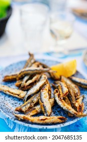 Close Up Of Delicious Grilled Fish Served For Lunch With White Wine