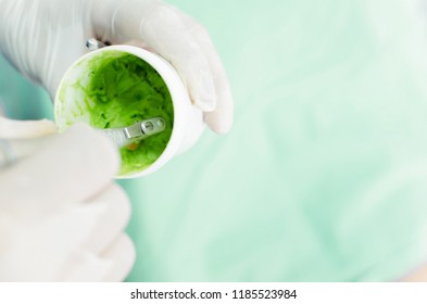 Close up of dentist preparing polish paste. Space for text. - Shutterstock ID 1185523984