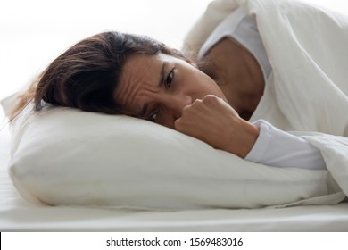 Close Up Depressed Woman Lying On Pillow In Bed Feels Unhappy About Ruined Relations Divorce, Break Up With Loved One, Disappointed Girl Cant Sleep Suffer From Sleeplessness, Sleep Disorder Concept