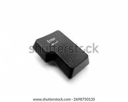Close up of a detached computer keyboard Enter key placed on a pure white background. Minimalist, high resolution macro shot ideal for tech tutorials, UI UX design, software ads, or keyboard repair