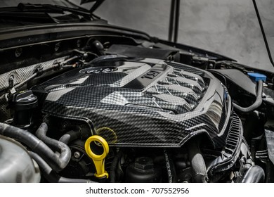 Close Up Detail Of Car Engine, Carbon Fiber Part