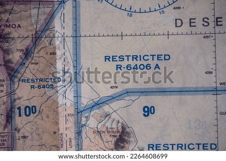 Close up detail of FAA sectional map showing restricted airspace national security flight regulation notes